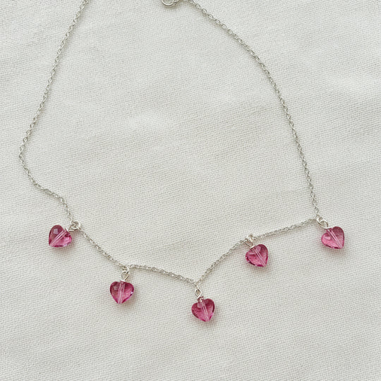 Pink Crystal Heart Necklace Jewelry, This Pink Crystal Heart Necklace is irresistibly sweet and petite, featuring five tiny heart-shaped crystals wire wrapped 