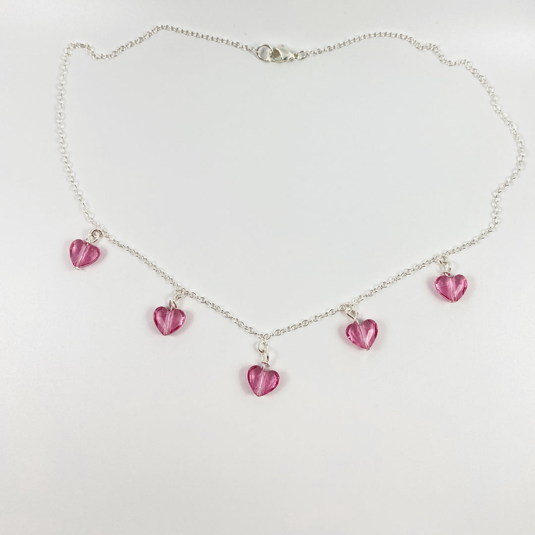 Pink Crystal Heart Necklace Jewelry, This Pink Crystal Heart Necklace is irresistibly sweet and petite, featuring five tiny heart-shaped crystals wire wrapped 
