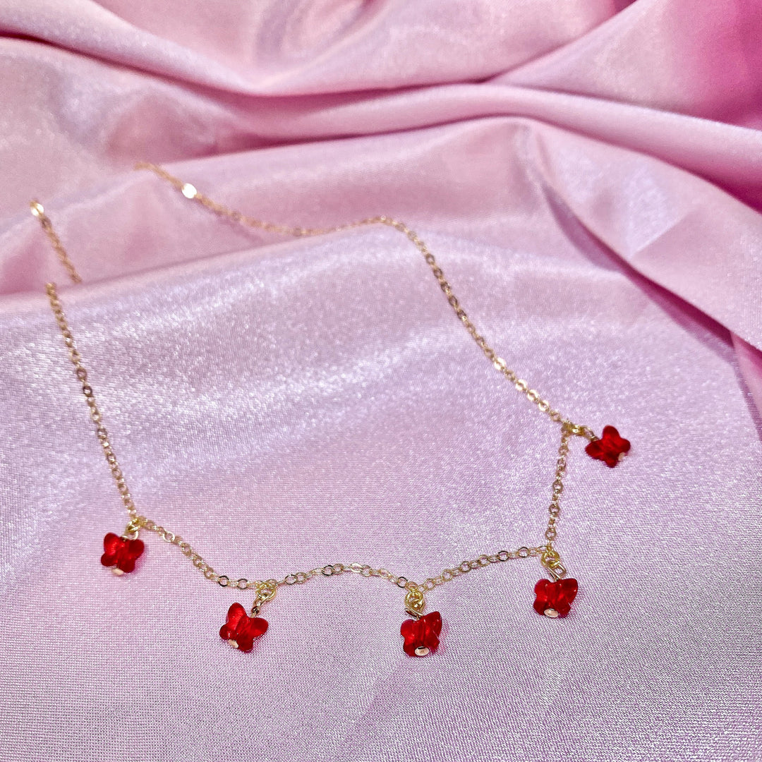 Ruby Red Butterfly Choker Necklace, Add a touch of charm with the Red Butterfly Choker Necklace, a delightful chain of crystal butterflies crafted by hand 