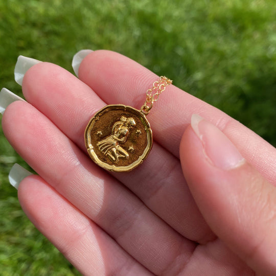Virgo Zodiac Sign Gold Necklace, this hand crafted Virgo Zodiac sign Necklace features a 14K gold-filled chain and an 18K vermeil gold charm. 
